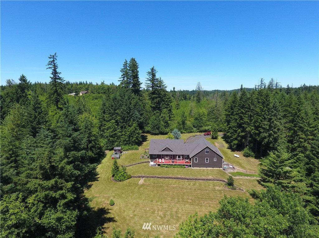 15837 Case Road Southwest Rochester, WA 98579 - Photo 40 of 40 a view of a house with a yard