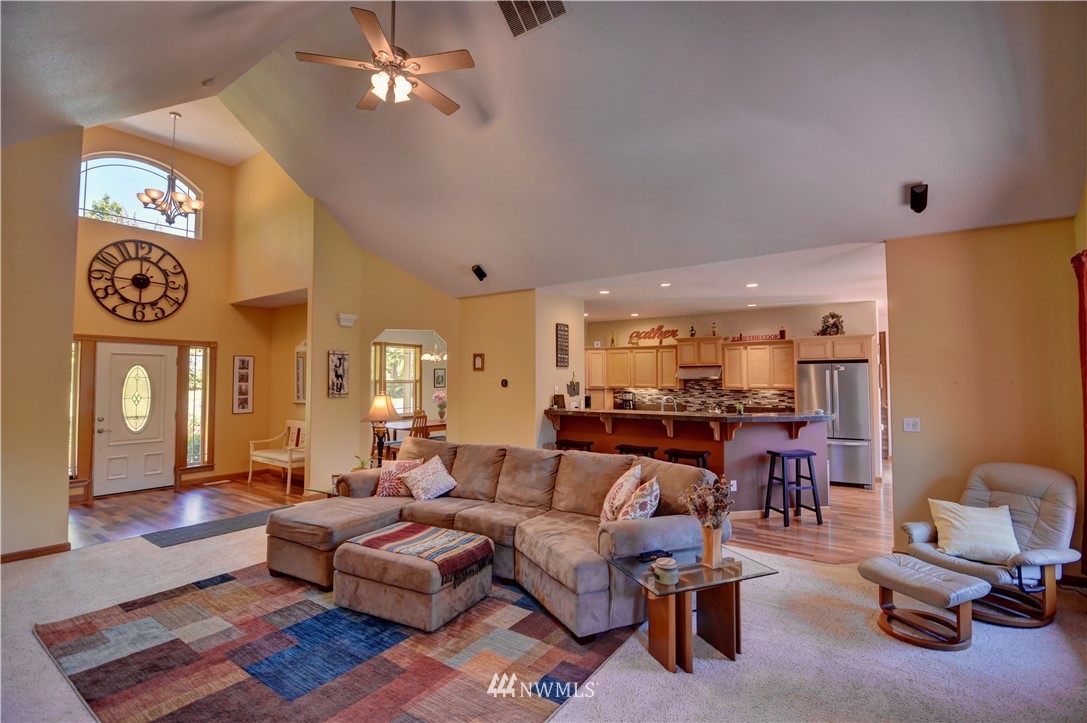 15837 Case Road Southwest Rochester, WA 98579 - Photo 5 of 40 a living room with furniture and wooden floor