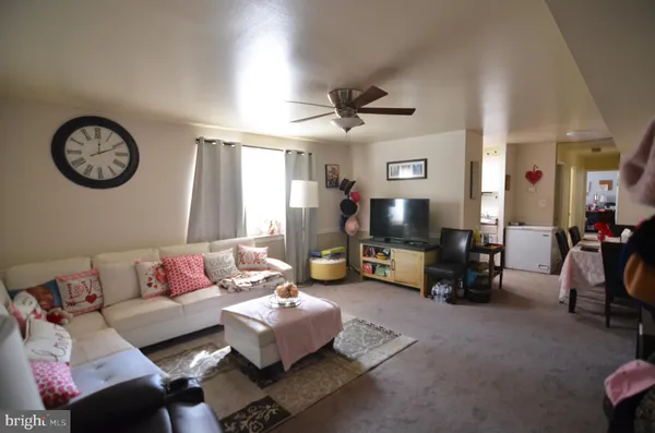 a living room with lots of furniture