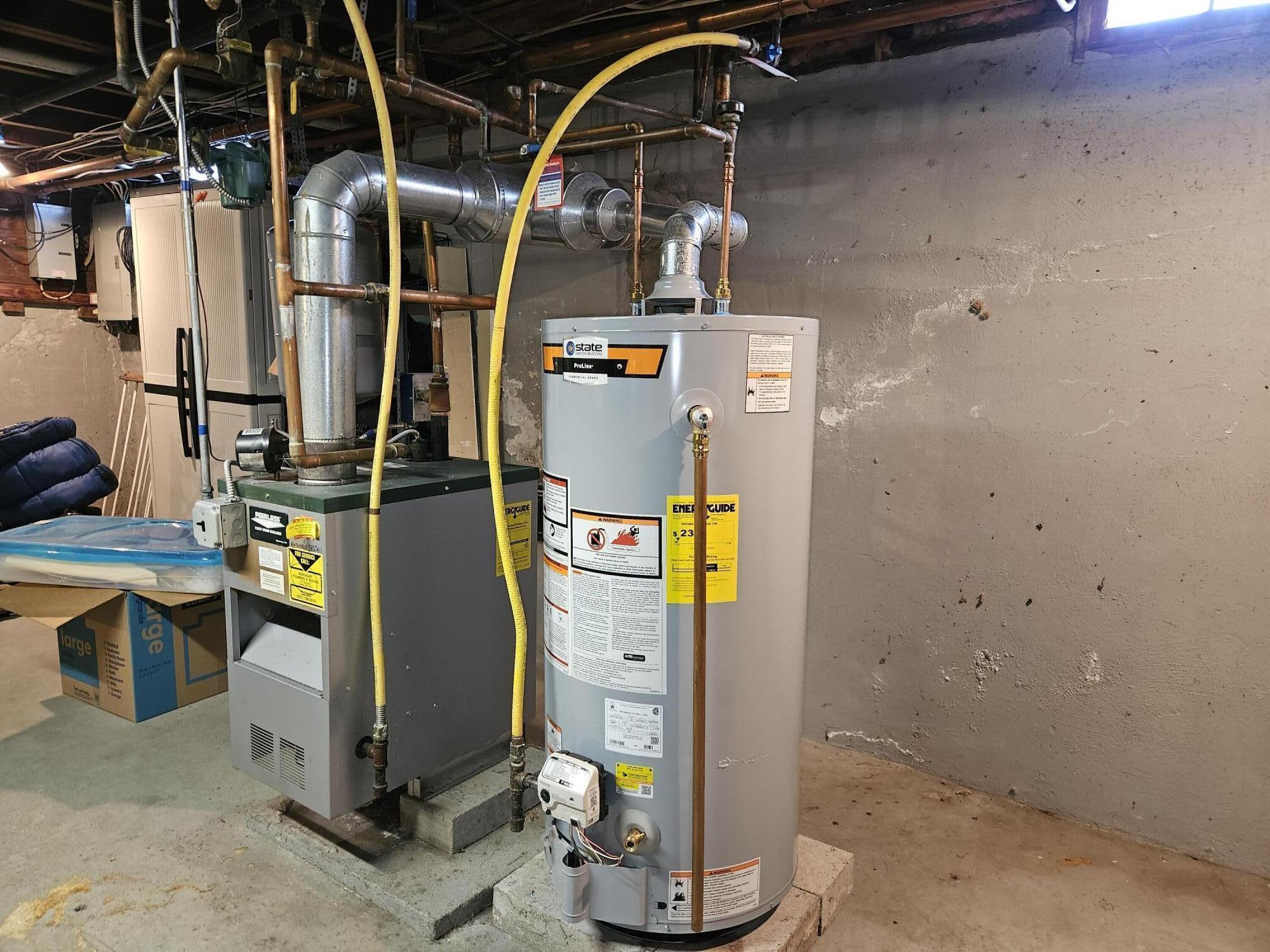 322 Webster Street Lewiston, ME 04240 - Photo 35 of 48 Gas furnace and Water heater