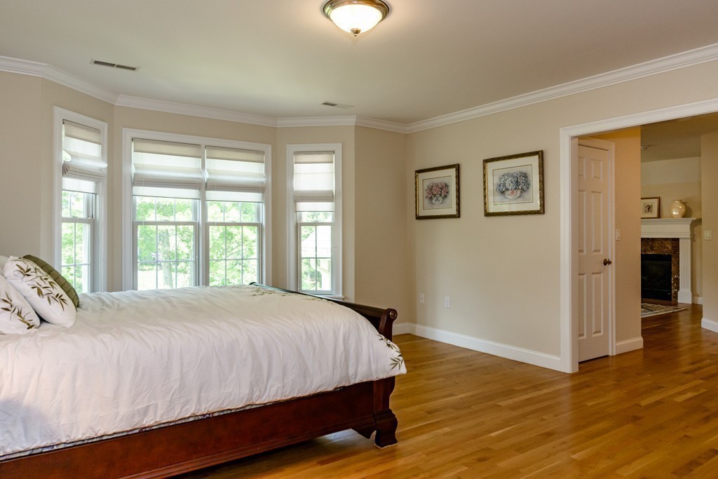 24 Overlook Drive Bedford, MA 01730 - Photo 19 of 30 a bedroom with a bed and a window