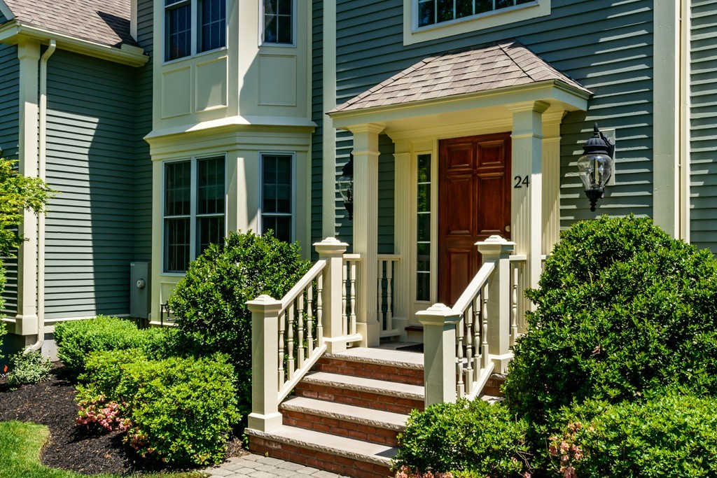 24 Overlook Drive Bedford, MA 01730 - Photo 29 of 30 a view of a brick house with front door