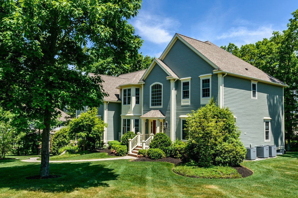 24 Overlook Drive Bedford, MA 01730 - Photo 30 of 30 a front view of a house with a yard and trees