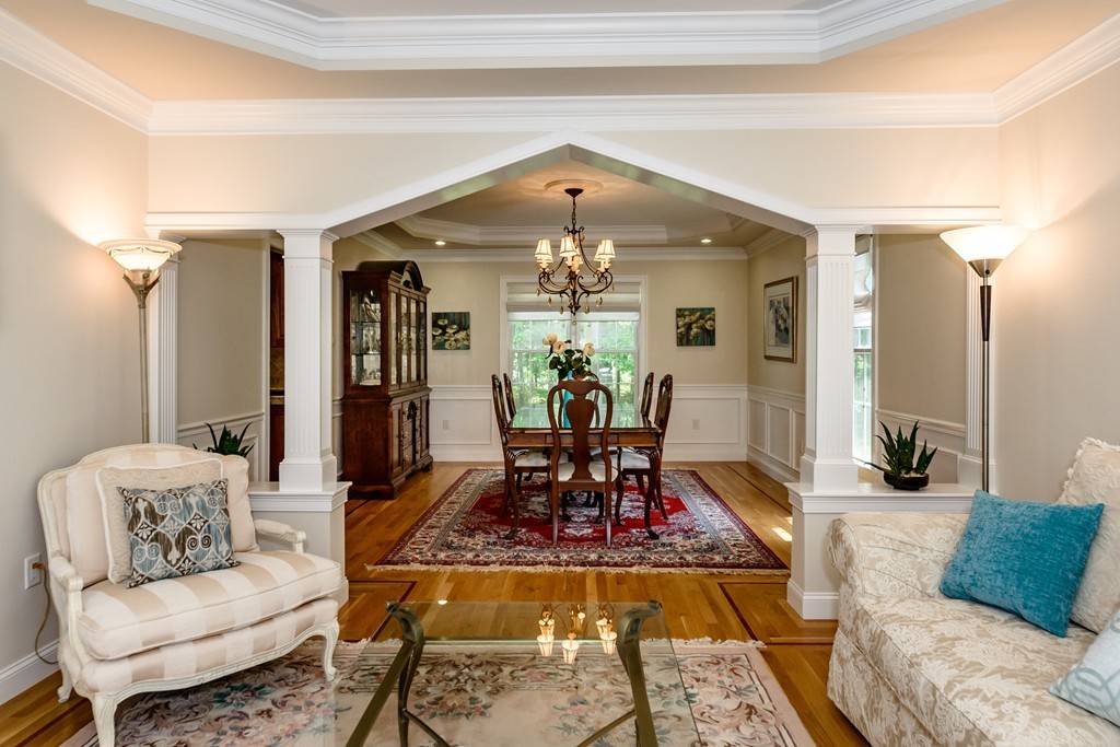 24 Overlook Drive Bedford, MA 01730 - Photo 5 of 30 a living room with furniture and a chandelier