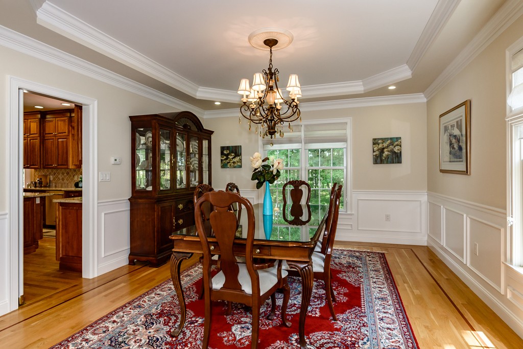 24 Overlook Drive Bedford, MA 01730 - Photo 6 of 30 a view of a dining room with furniture window and wooden floor