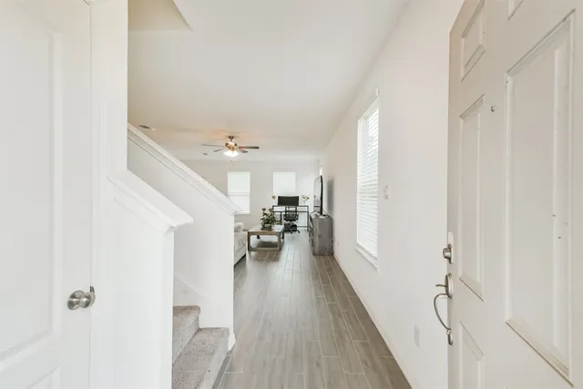 a very nice looking room with wooden floor