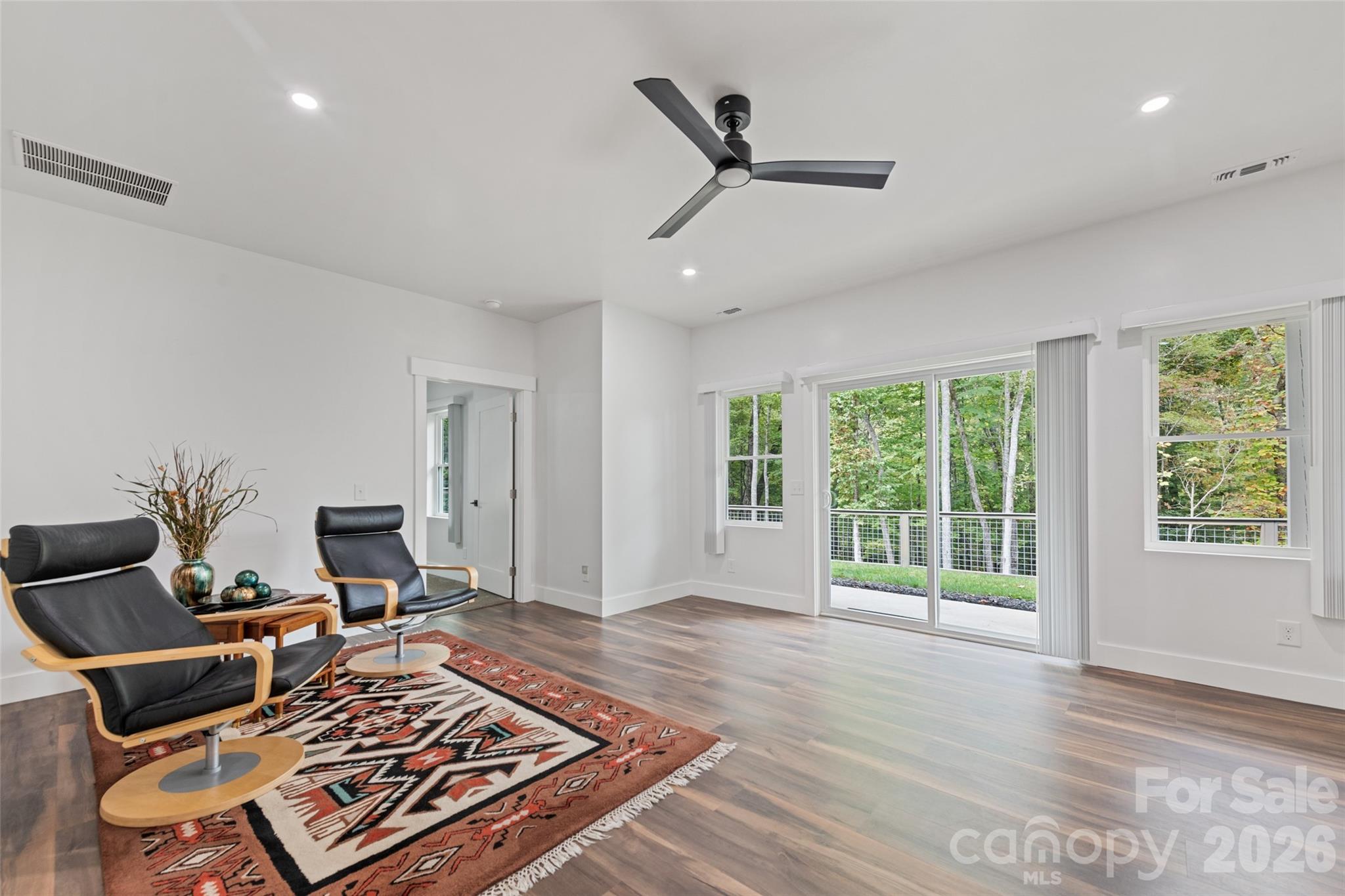 1185 Wallalieu Road Otto, NC 28763 - Photo 31 of 43 a living room with furniture and a window