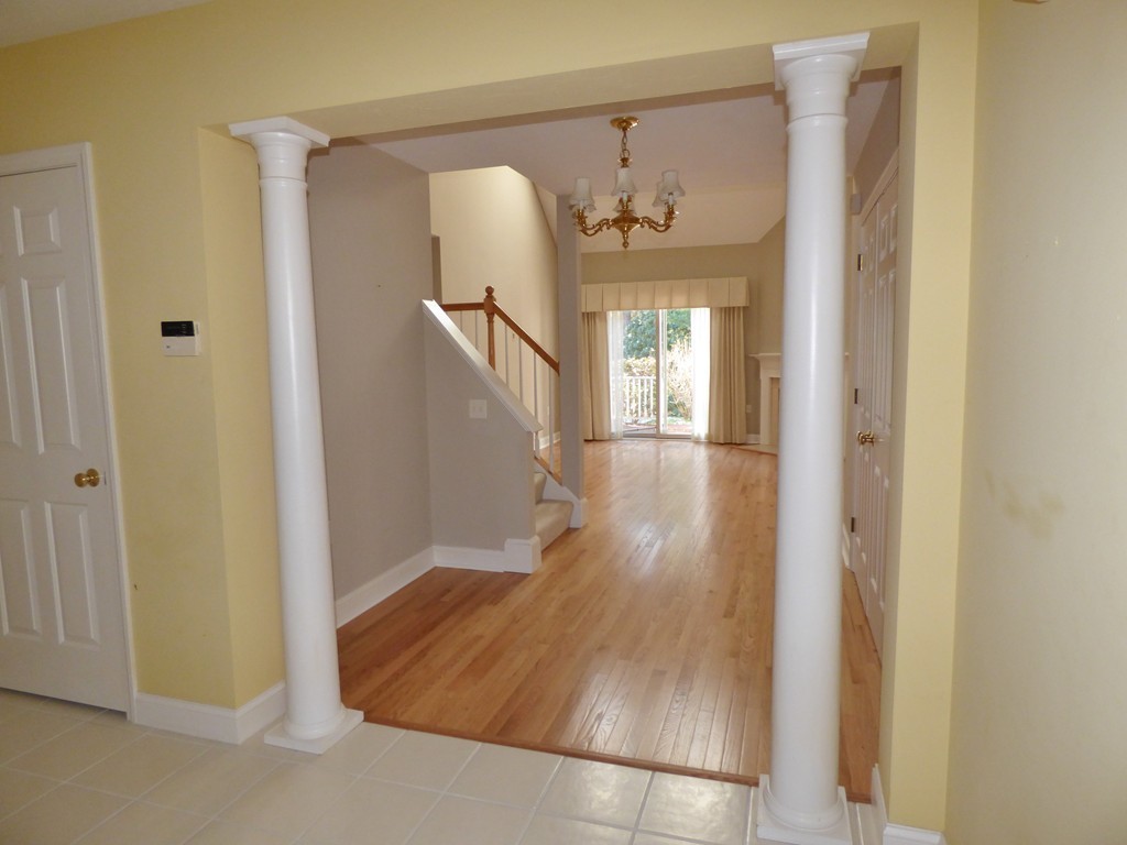 14 Stratford Ridge, Unit 14 Mashpee, MA 02649 - Photo 2 of 23 a view of a livingroom from a hallway