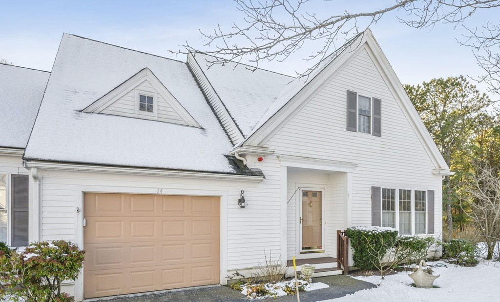 14 Stratford Ridge, Unit 14 Mashpee, MA 02649 - Photo 3 of 23 a front view of a house with a yard