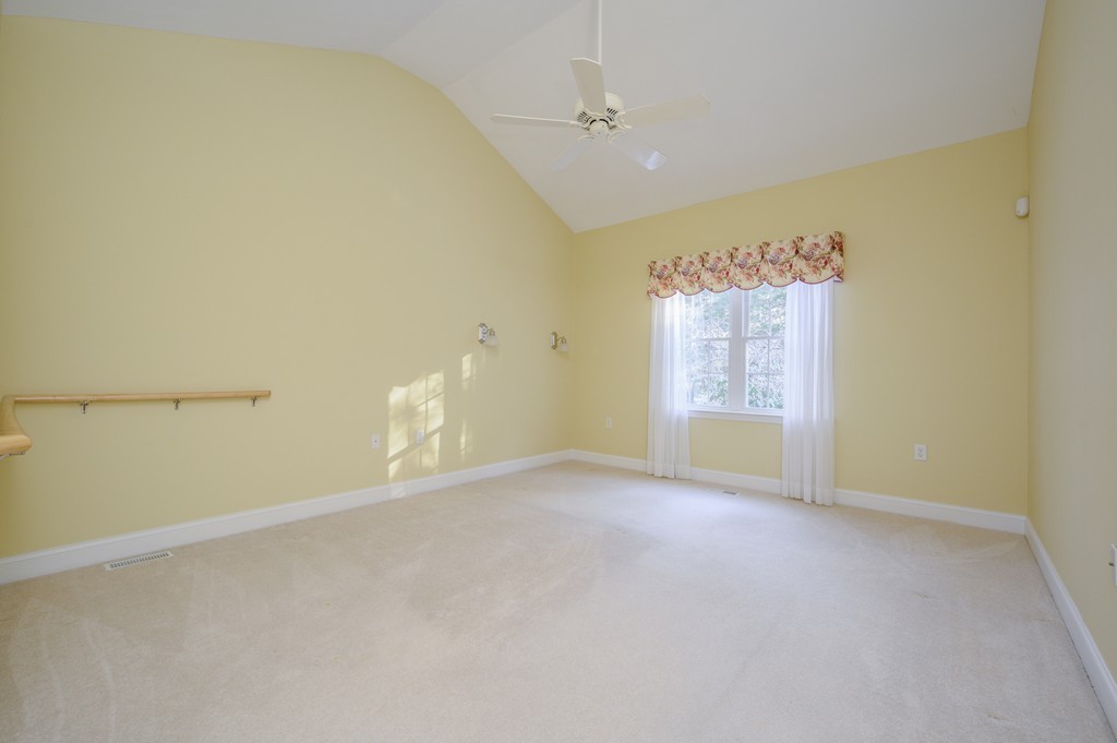 14 Stratford Ridge, Unit 14 Mashpee, MA 02649 - Photo 10 of 23 an empty room with windows