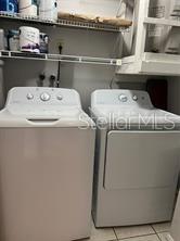 13250 Ridge Road, Unit 3B1 Largo, FL 33778 - Photo 12 of 15 a utility room with dryer and washer