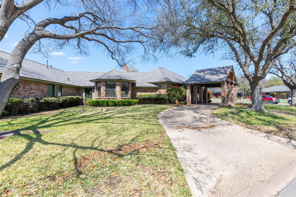50 Riviera Circle Abilene, TX 79606 - Photo 2 of 40 a front view of a house with a yard