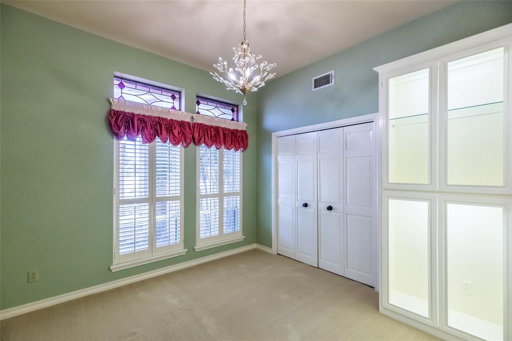 50 Riviera Circle Abilene, TX 79606 - Photo 26 of 40 a view of a chandelier and window in the room