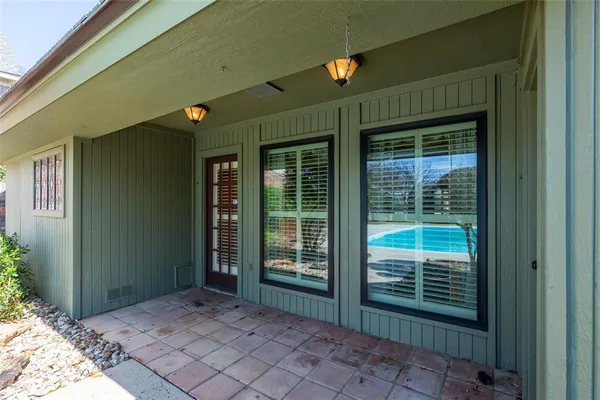 a utility room with cabinets