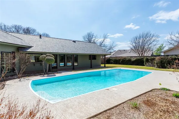 a house view with a outdoor space