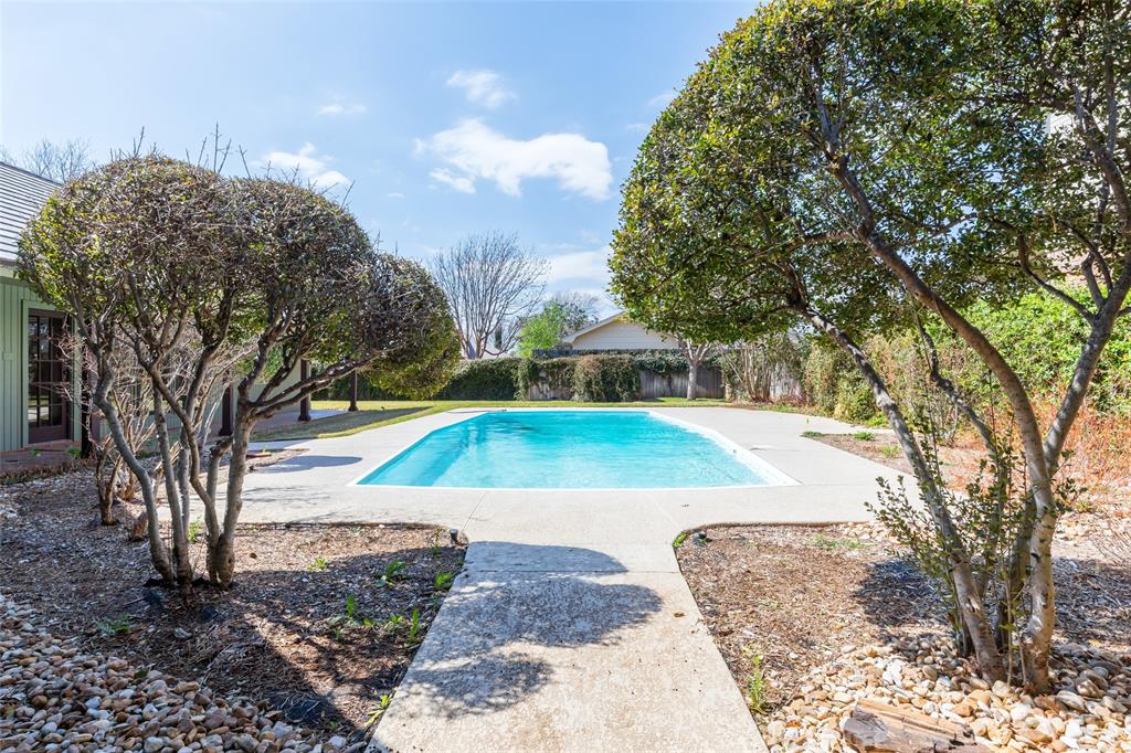 50 Riviera Circle Abilene, TX 79606 - Photo 37 of 40 a view of a backyard with swimming pool