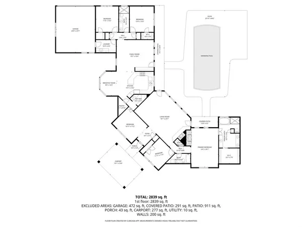 a view of a backyard with swimming pool