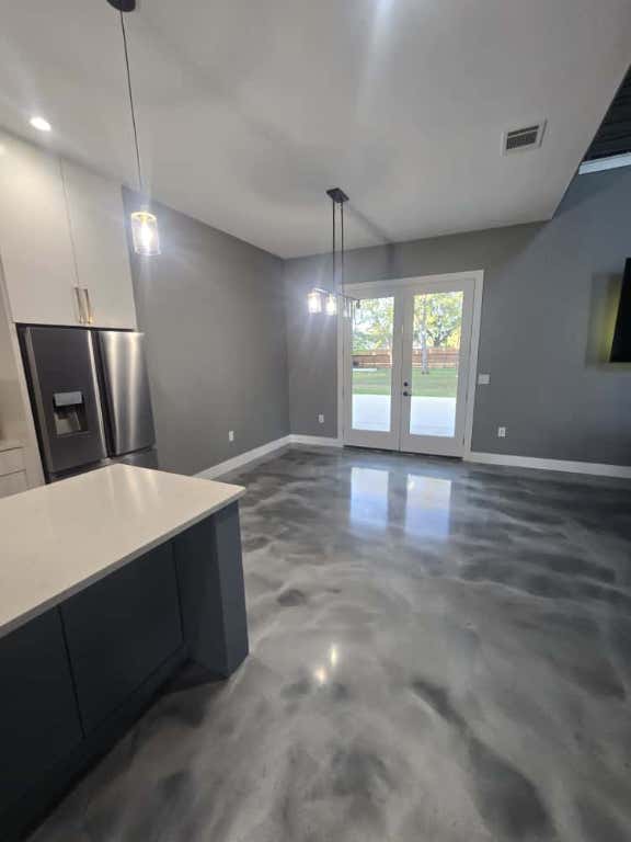 724 Ramsey Avenue Rockdale, TX 76567 - Photo 11 of 36 a view of a hallway with windows