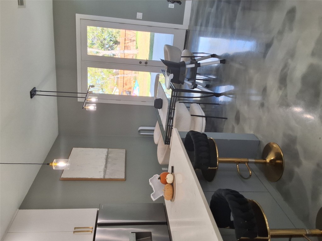 724 Ramsey Avenue Rockdale, TX 76567 - Photo 12 of 36 a view of a dining room with furniture and window