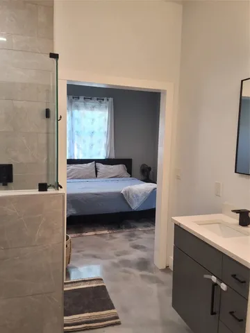 a bathroom with a sink and a bathtub