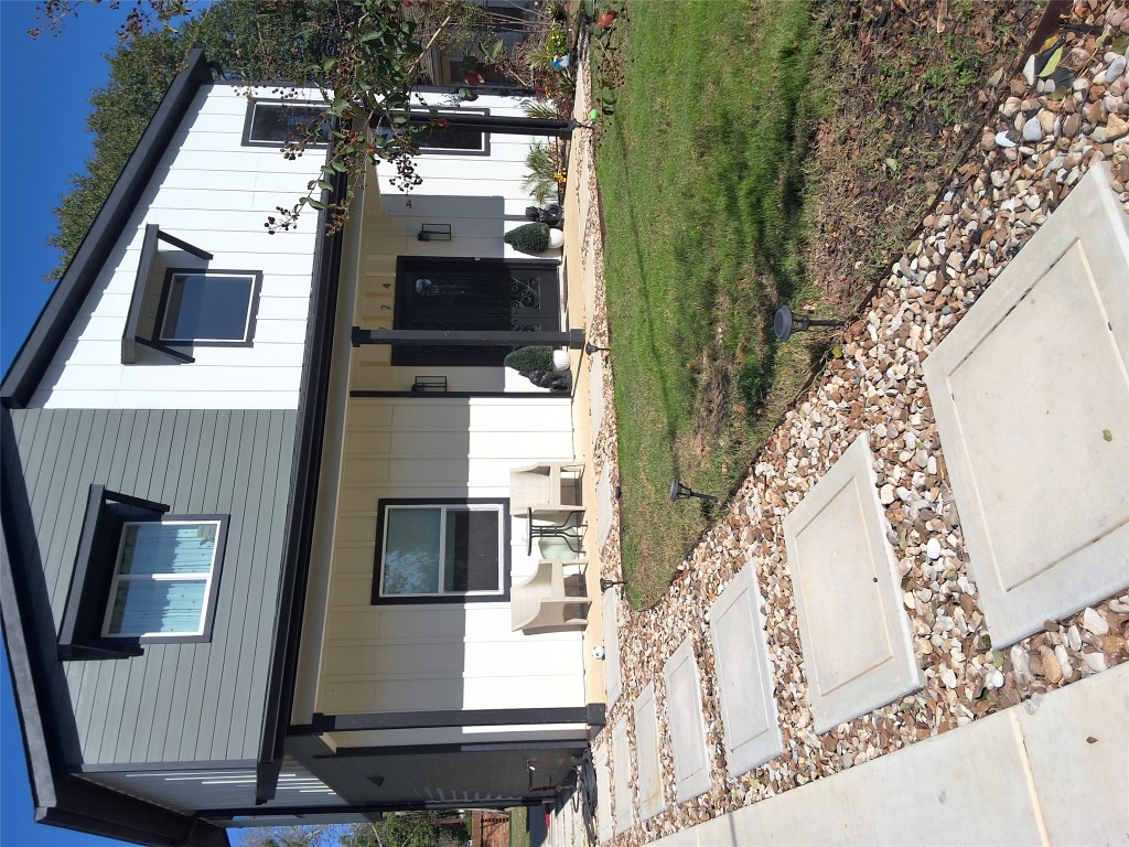 724 Ramsey Avenue Rockdale, TX 76567 - Photo 36 of 36 a view of a house with a yard and sitting area