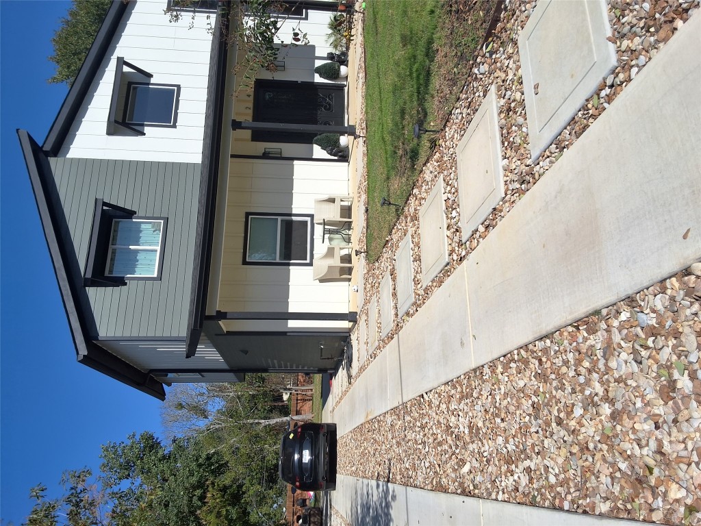 724 Ramsey Avenue Rockdale, TX 76567 - Photo 5 of 36 a view of a house with a patio