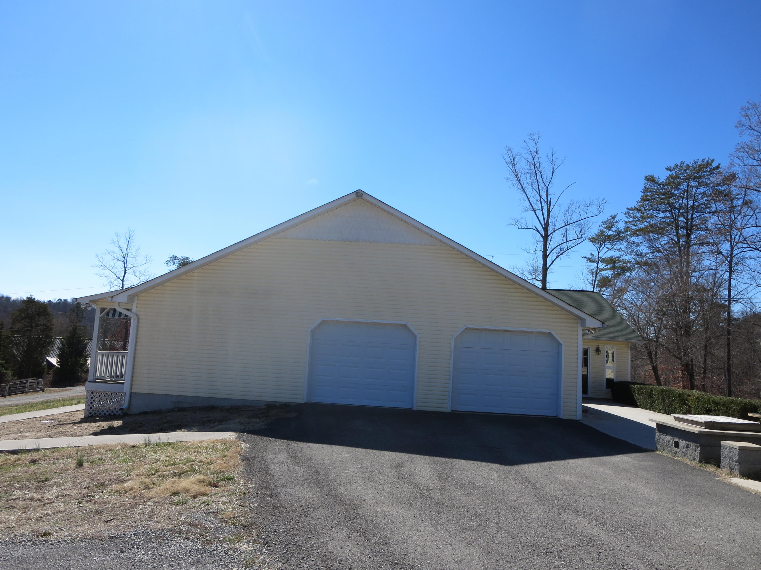 2772 Hinds Creek Road Heiskell, TN 37754 - Photo 2 of 21 Right Side / Garage View