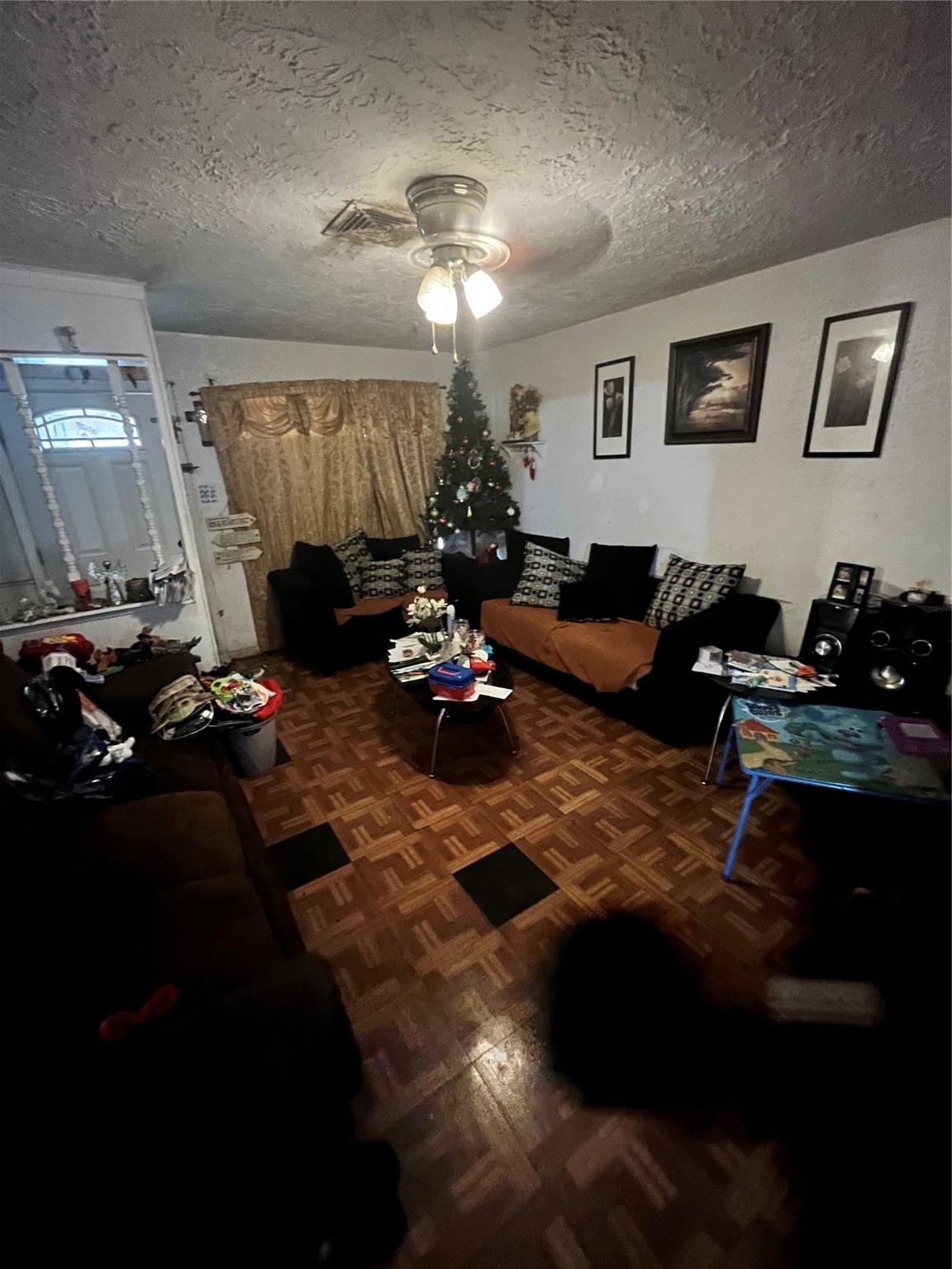 4306 Kelling Street Houston, TX 77045 - Photo 2 of 15 a living room with furniture chess board and a window