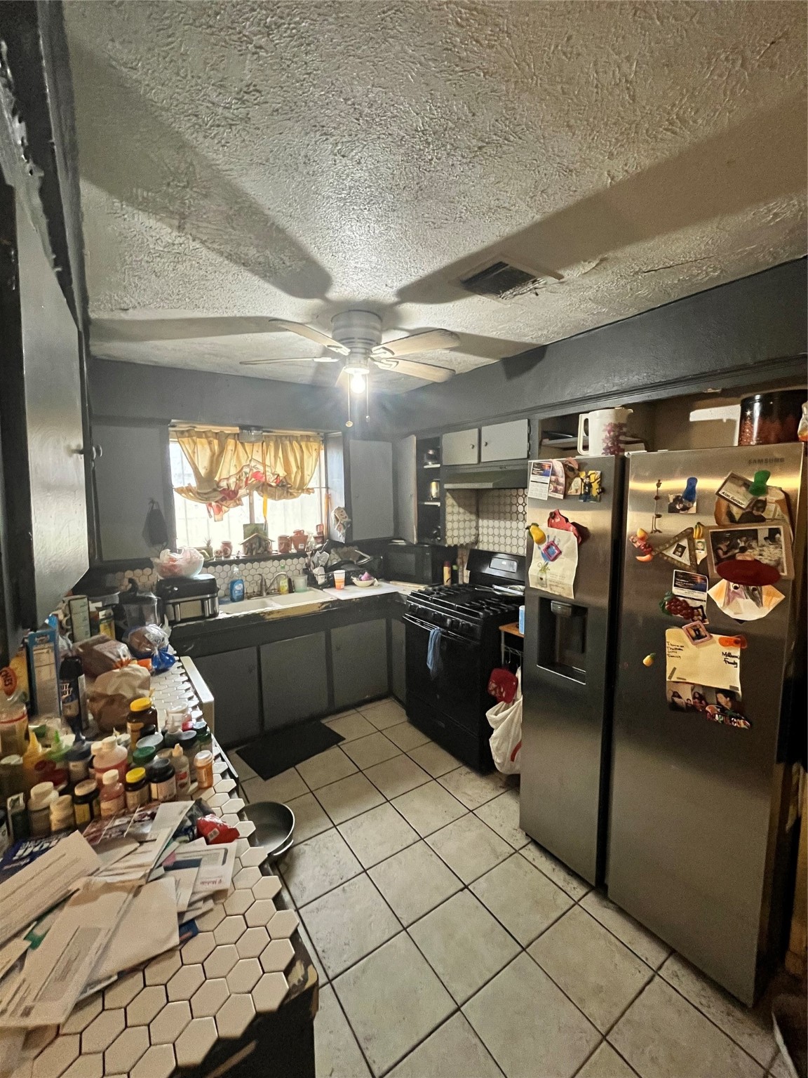 4306 Kelling Street Houston, TX 77045 - Photo 6 of 15 a kitchen with lots of counter top space