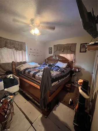 a bedroom with a bed and a closet