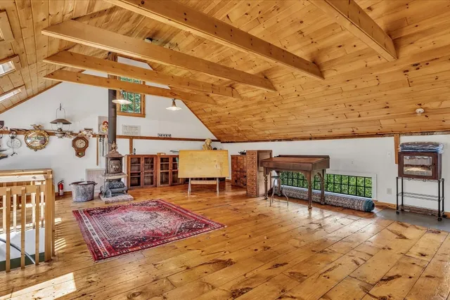 a view of a backyard with sitting area