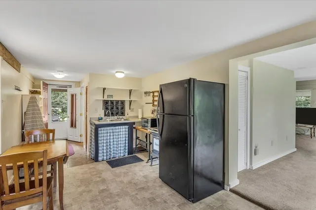 a room with furniture and a window