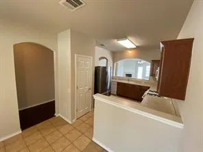 a kitchen with stainless steel appliances a refrigerator and a sink