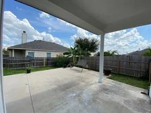 a house view with a garden space