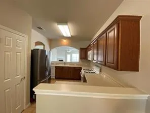 a bathroom with a tub and a sink