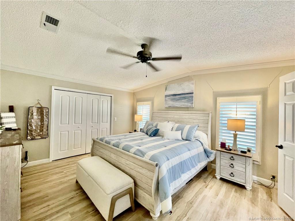 14513 Southwest Rake Drive Indiantown, FL 34956 - Photo 7 of 32 Plantation shutters, extra large closet & oversized ceiling fan