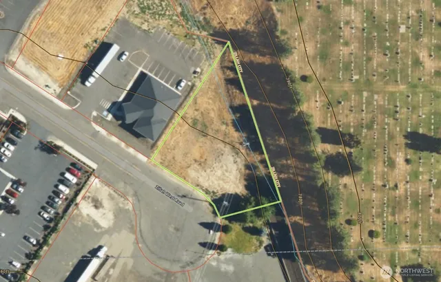 a aerial view of a house with a yard