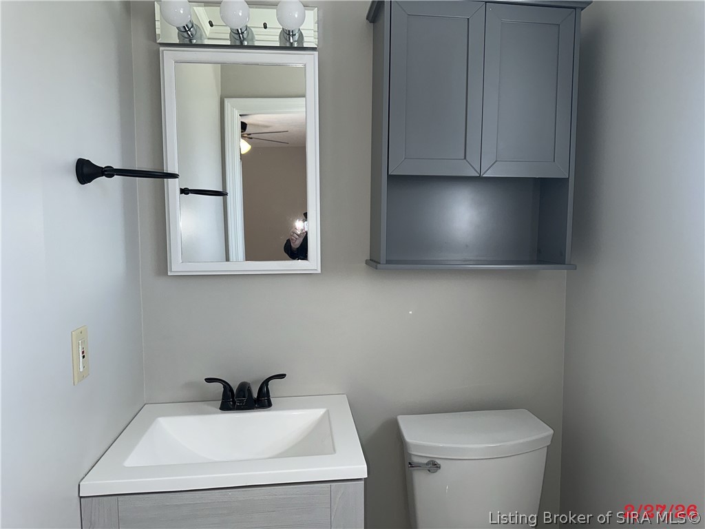 1801 Rita Drive New Albany, IN 47150 - Photo 14 of 37 half bath that joins the primary suite.