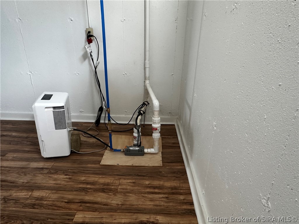 1801 Rita Drive New Albany, IN 47150 - Photo 20 of 37 sump pump in the basement has a water back up system.
