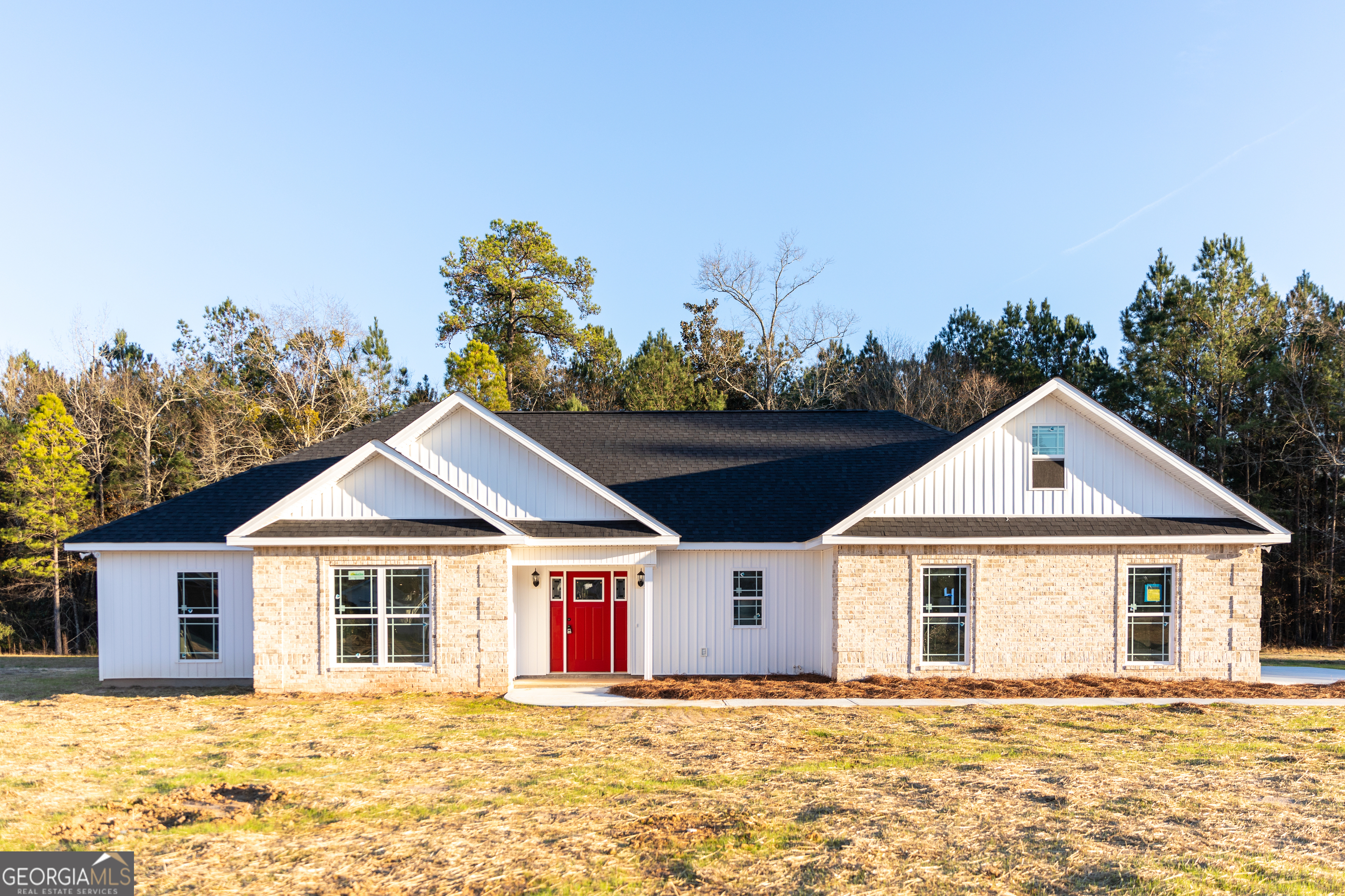 107 Hedge Row Dublin, GA 31021 - Photo 1 of 1 a front view of a house with a yard