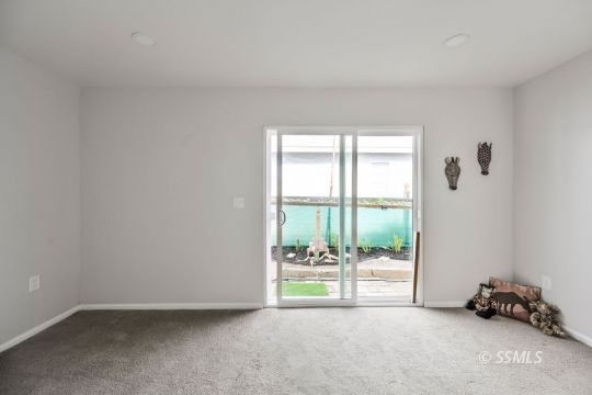 420 West Upjohn Avenue Ridgecrest, CA 93555 - Photo 23 of 32 an empty room with large windows