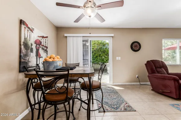 a view of a livingroom with furniture and a chandelier