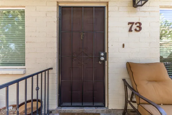a view of balcony and wooden floor