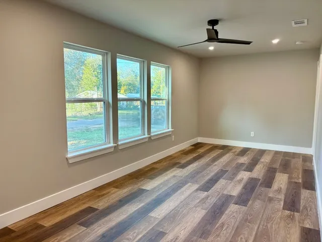 a view of an empty room and window