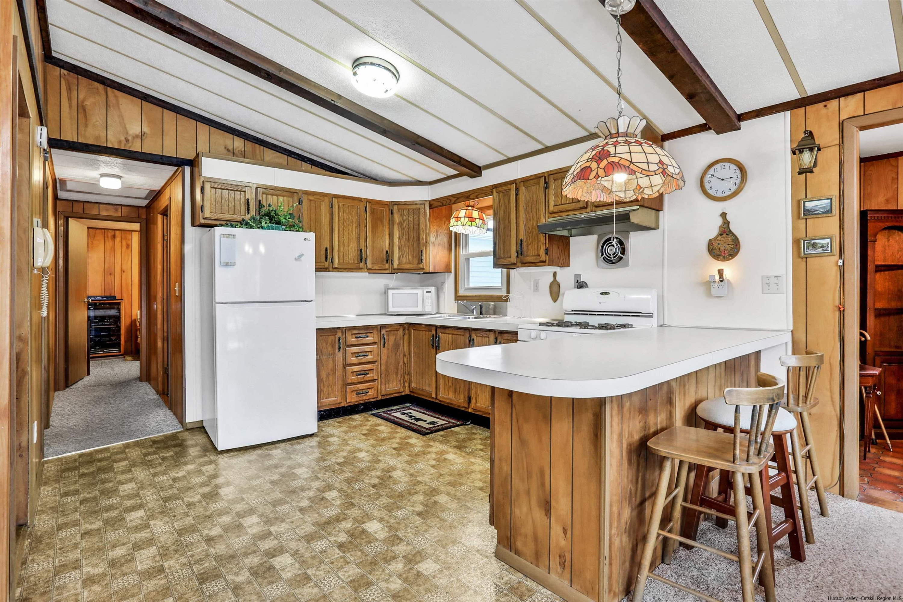 60 Grandview Acres Road Phoenicia, NY 12464 - Photo 11 of 21 a kitchen with refrigerator and cabinets