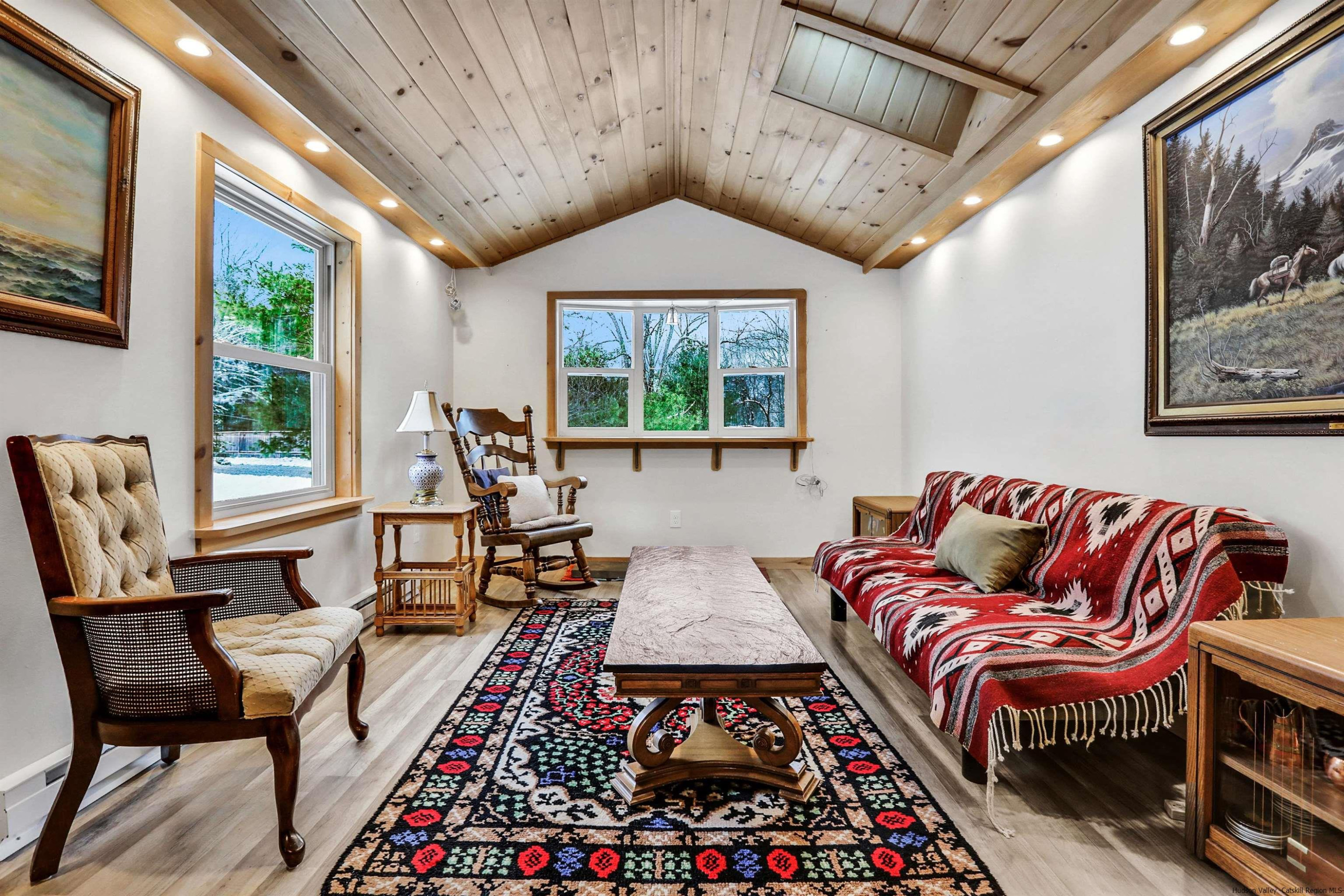60 Grandview Acres Road Phoenicia, NY 12464 - Photo 14 of 21 a living room with furniture a rug and a window