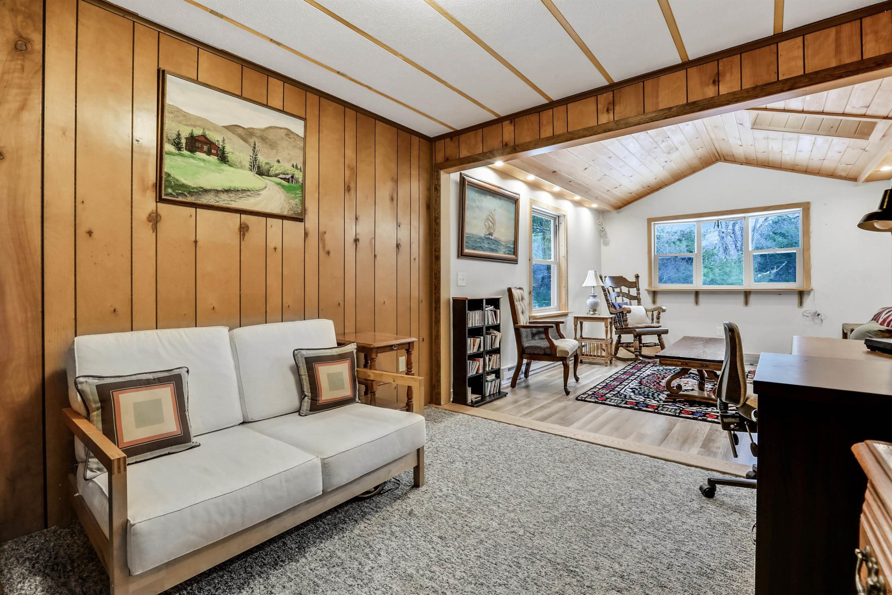 60 Grandview Acres Road Phoenicia, NY 12464 - Photo 16 of 21 a living room with furniture and a flat screen tv