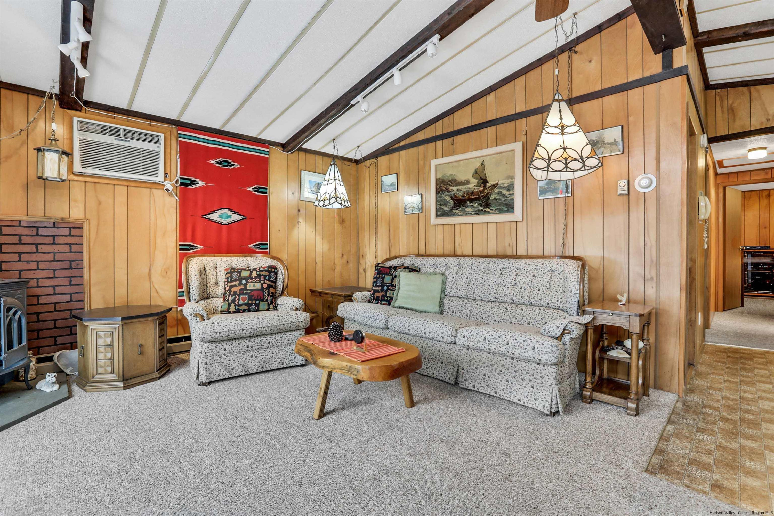 60 Grandview Acres Road Phoenicia, NY 12464 - Photo 7 of 21 a living room with furniture and a chandelier