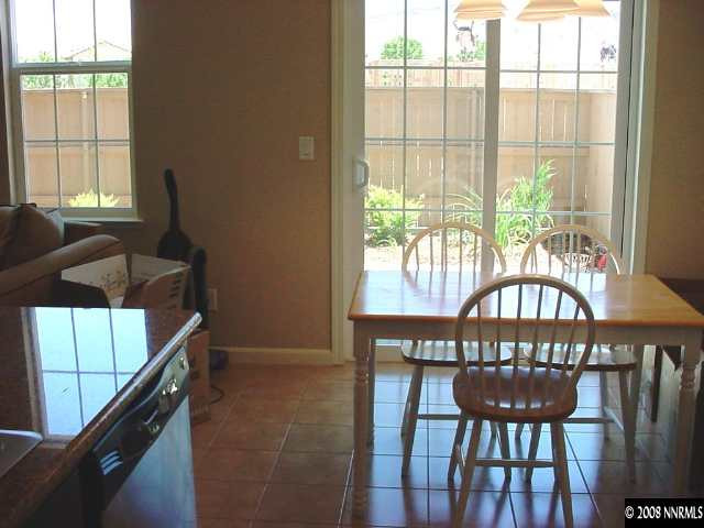 1791 A Wind Ranch Road Reno, NV 89521 - Photo 4 of 9 a view of a chairs and table in the balcony