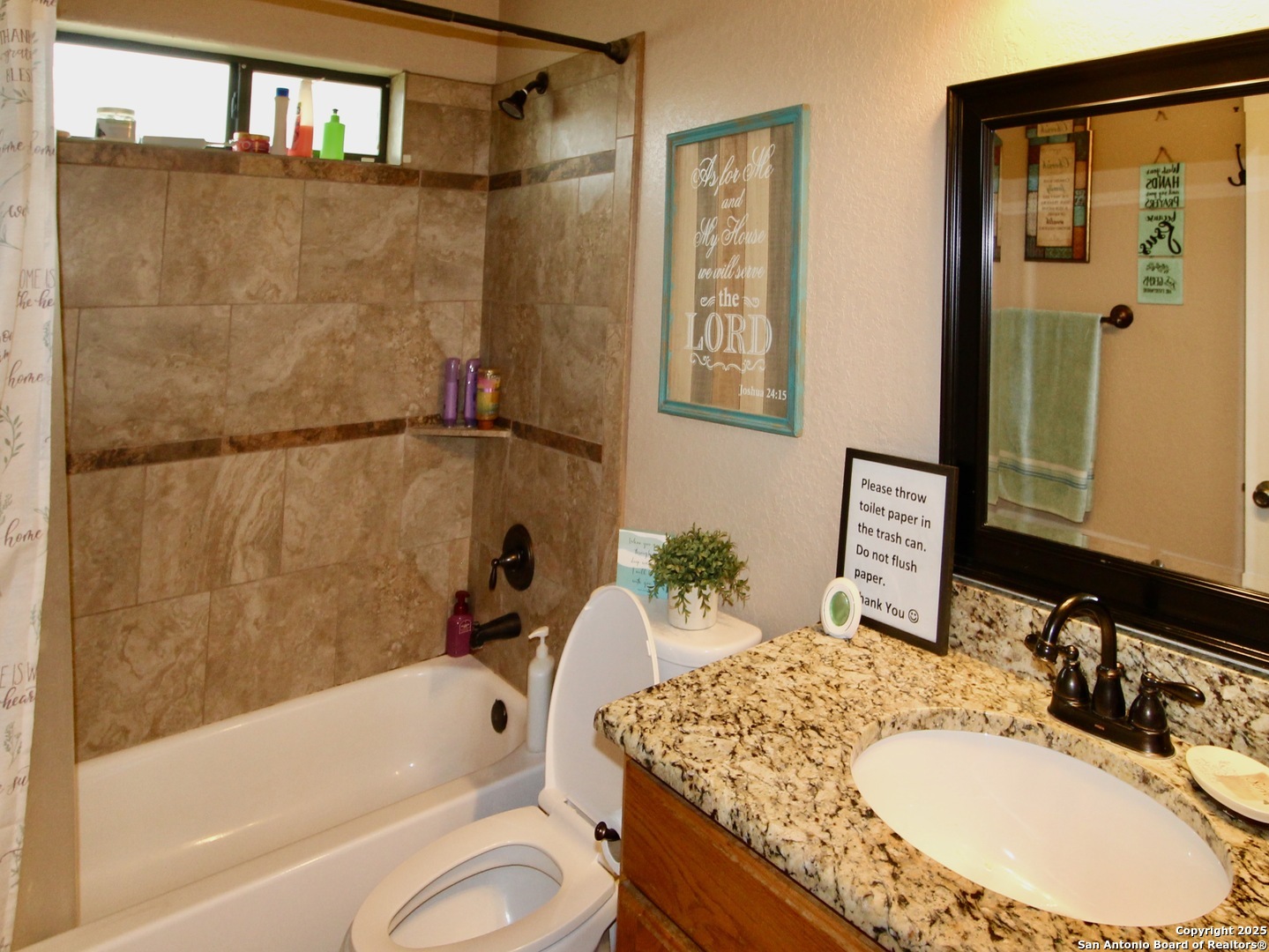 12365 Rudolph Road, Unit 3 Atascosa, TX 78002 - Photo 17 of 42 a bathroom with a granite countertop sink toilet and shower